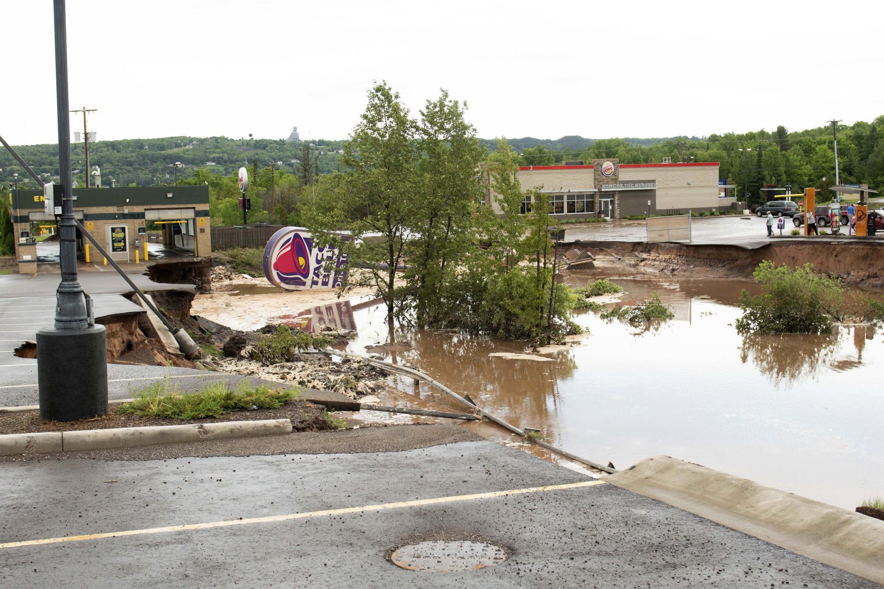 Michigan Taco Bell drive-through washed away, AP photo
